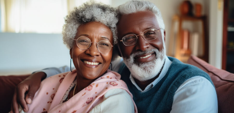 An elderly couple wearing glasses. Web accessibility standards ensure that the web is usable for everyone.